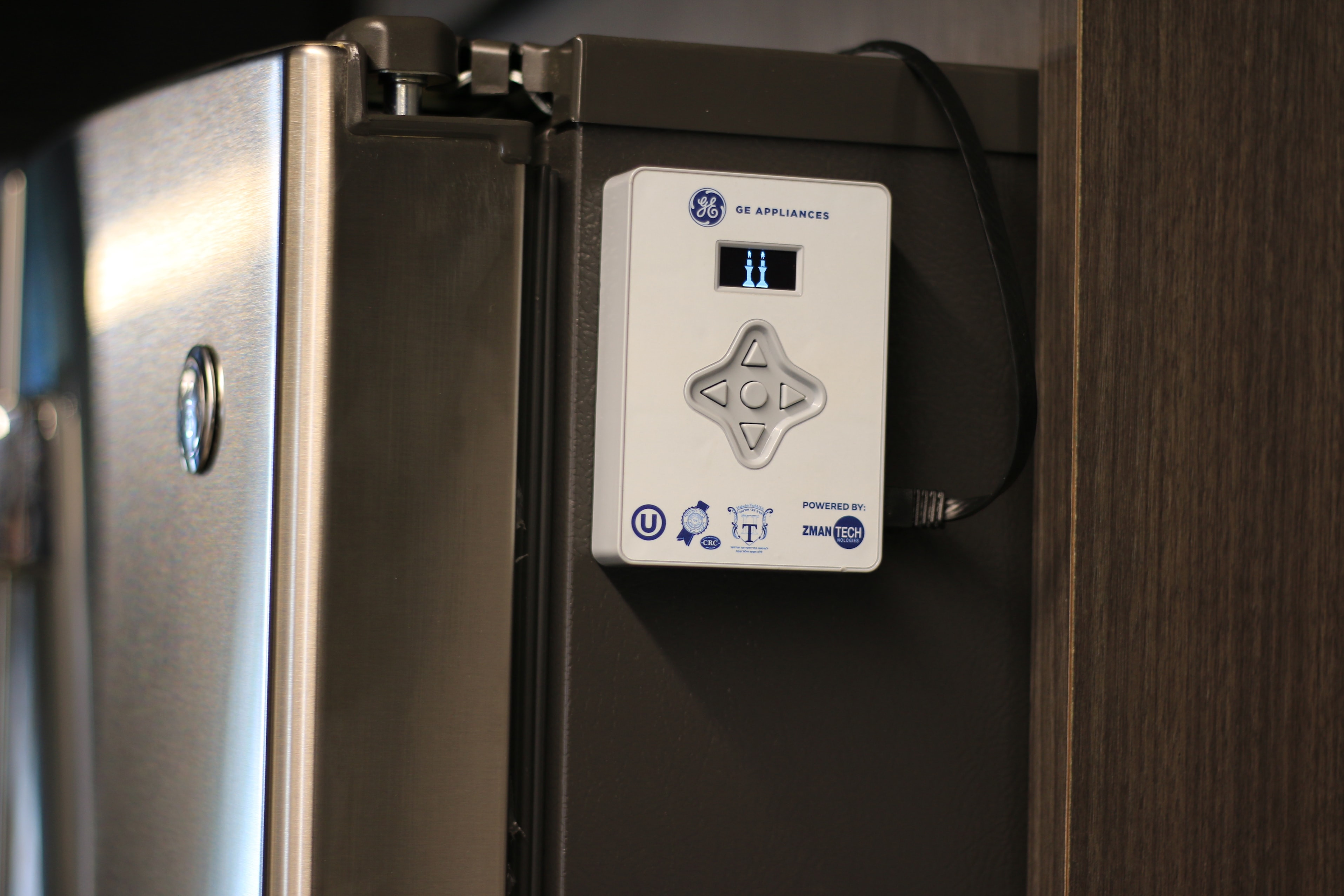 Ge refrigerator ice maker reset